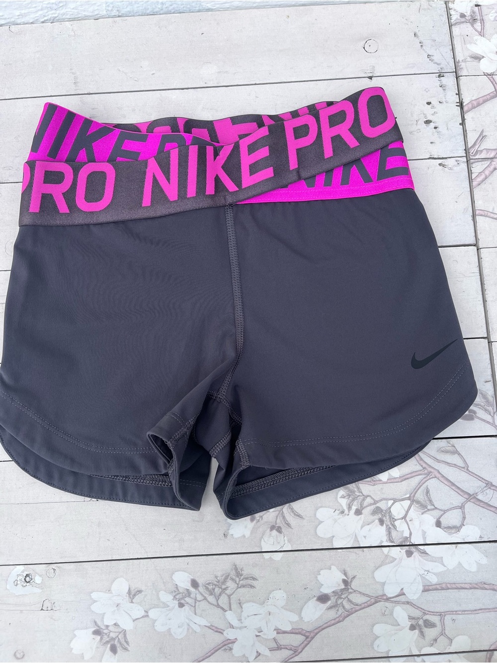 Nike Women’s Dark Gray Athletic Shorts with Pink Logo Waistband